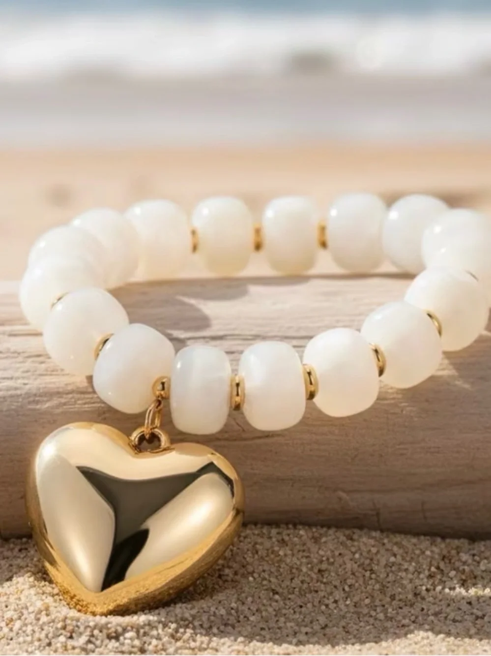 White Beaded Necklace with Gold Heart Pendant
